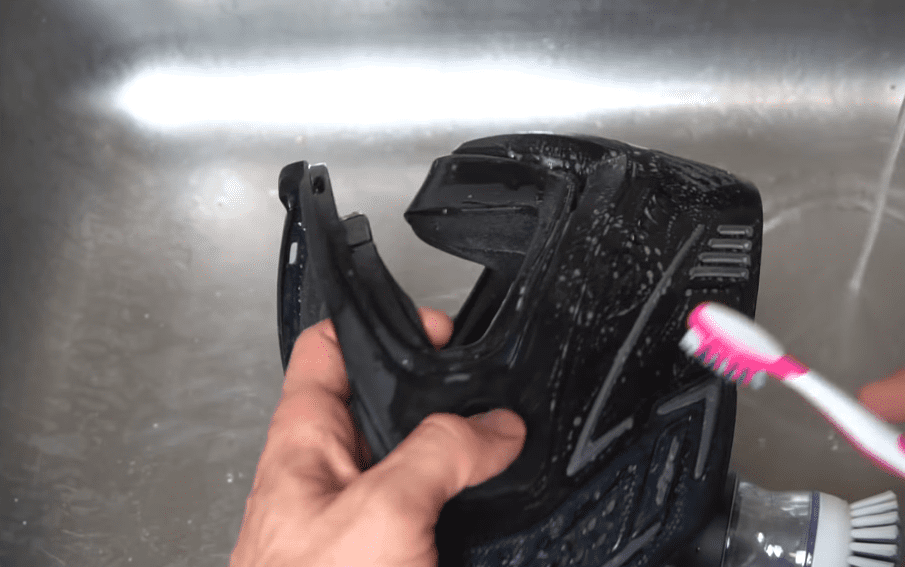 how to clean paintball mask with brush.
